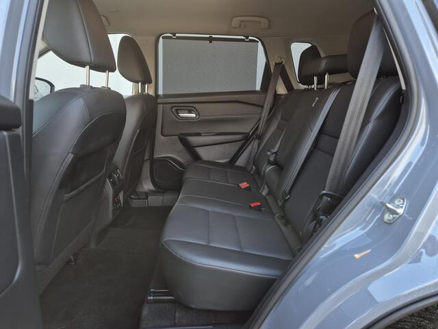 Nissan X-TRAIL 1.5 MHEV 163pk Tekna Automaat / Fabrieksgarantie tot 28-04-2028 / Trekgewicht 2000 kg / Allseason banden / HUD / Elektrische achterklep / Stuur-, Stoel en Achterbank verwarming / Rondomzicht camera /