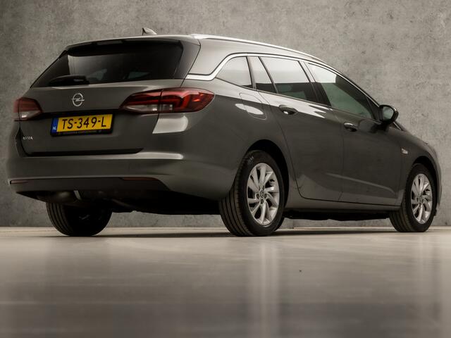 Opel ASTRA Sports Tourer 1.0 Innovation Sport (APPLE CARPLAY, GROOT NAVI, CLIMATE, LEDER, GETINT GLAS, SPORTSTOELEN, CAMERA, LM VELGEN, LED KOPLAMPEN, NIEUWSTAAT)