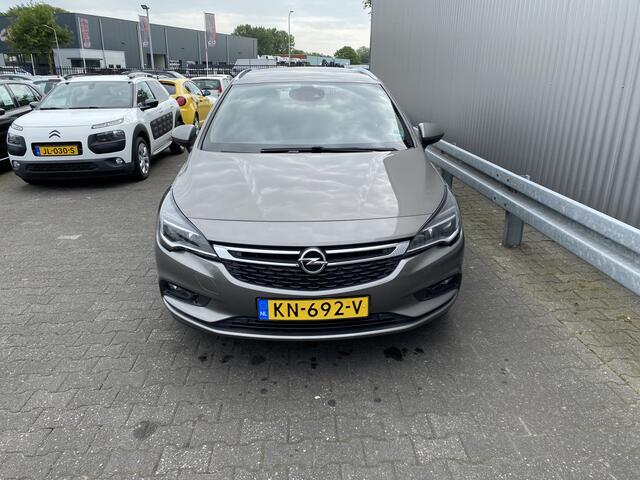 Opel ASTRA Sports Tourer 1.0 Business+ Clima, CC, DAB+, Navi, PDC, z.g.a.n. APK - Inruil Mogelijk -