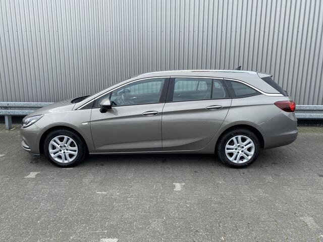 Opel ASTRA Sports Tourer 1.0 Business+ Clima, CC, DAB+, Navi, PDC, z.g.a.n. APK - Inruil Mogelijk -