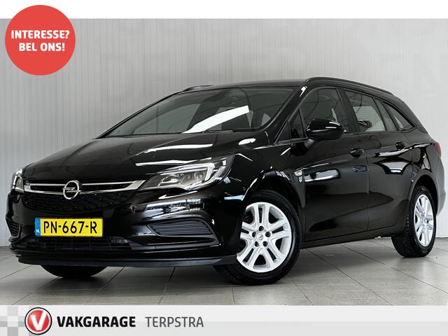 Opel ASTRA Sports Tourer 1.0 Online Edition/ Apple + Android/ DAB+/ Navi/ Airco/ Cruise/ Elek. pakket/ Isofix/ Bluetooth/ Armsteun/ Multi. LEDER. Stuur/ PDC V+A.