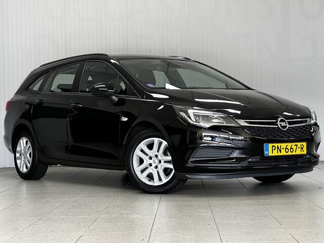 Opel ASTRA Sports Tourer 1.0 Online Edition/ Apple + Android/ DAB+/ Navi/ Airco/ Cruise/ Elek. pakket/ Isofix/ Bluetooth/ Armsteun/ Multi. LEDER. Stuur/ PDC V+A.