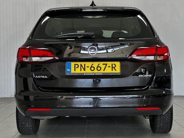 Opel ASTRA Sports Tourer 1.0 Online Edition/ Apple + Android/ DAB+/ Navi/ Airco/ Cruise/ Elek. pakket/ Isofix/ Bluetooth/ Armsteun/ Multi. LEDER. Stuur/ PDC V+A.