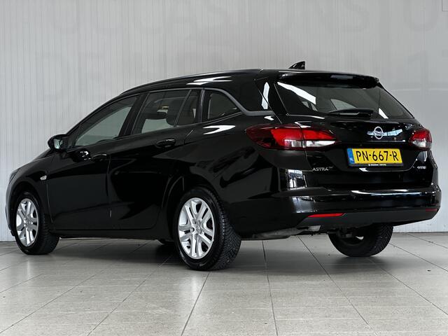 Opel ASTRA Sports Tourer 1.0 Online Edition/ Apple + Android/ DAB+/ Navi/ Airco/ Cruise/ Elek. pakket/ Isofix/ Bluetooth/ Armsteun/ Multi. LEDER. Stuur/ PDC V+A.