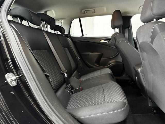 Opel ASTRA Sports Tourer 1.0 Online Edition/ Apple + Android/ DAB+/ Navi/ Airco/ Cruise/ Elek. pakket/ Isofix/ Bluetooth/ Armsteun/ Multi. LEDER. Stuur/ PDC V+A.