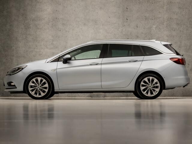 Opel ASTRA Sports Tourer 1.4 Innovation 150Pk Automaat (APPLE CARPLAY, GROOT NAVI, CLIMATE, CAMERA, LEDER, SPORTSTOELEN, ADAPTIVE CRUISE, PARKEERSENSOREN, LANE ASSIST, NIEUWE APK, NIEUWSTAAT)
