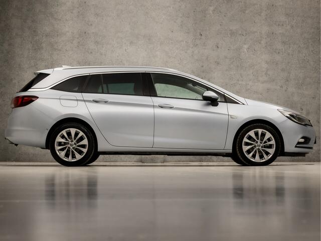 Opel ASTRA Sports Tourer 1.4 Innovation 150Pk Automaat (APPLE CARPLAY, GROOT NAVI, CLIMATE, CAMERA, LEDER, SPORTSTOELEN, ADAPTIVE CRUISE, PARKEERSENSOREN, LANE ASSIST, NIEUWE APK, NIEUWSTAAT)