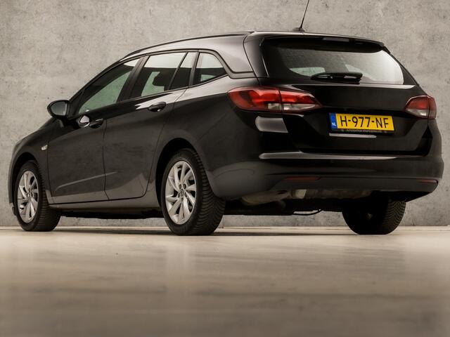 Opel ASTRA Sports Tourer 1.2 Sport (APPLE CARPLAY, NAVIGATIE, CAMERA, CLIMATE, CRUISE, SPORTSTOELEN, PARKEERSENSOREN, NIEUWE APK, NIEUWSTAAT)