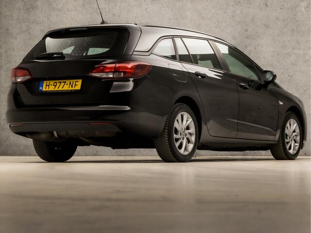 Opel ASTRA Sports Tourer 1.2 Sport (APPLE CARPLAY, NAVIGATIE, CAMERA, CLIMATE, CRUISE, SPORTSTOELEN, PARKEERSENSOREN, NIEUWE APK, NIEUWSTAAT)