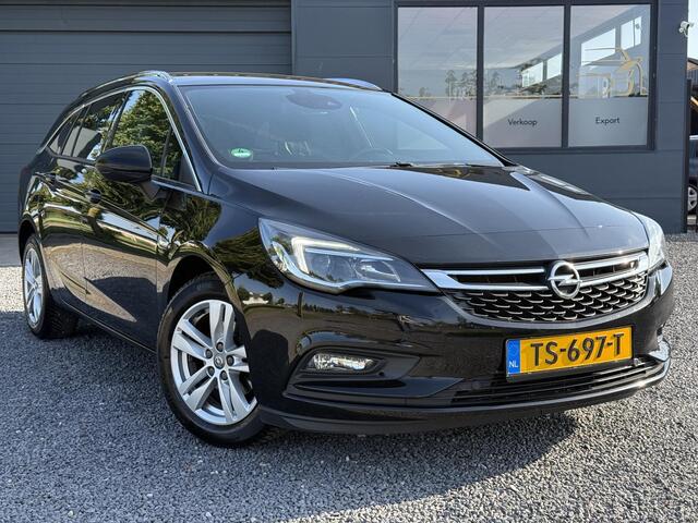 Opel ASTRA Sports Tourer 1.4 Innovation Automaat,Navi,Trekhaak,Camera,Clima,Cruise,150pk,Lm velgen,Pdc V+A,Elekt.Stoelen,Stoelverwarming,Stuurverwarming,Apk tot 07-2026