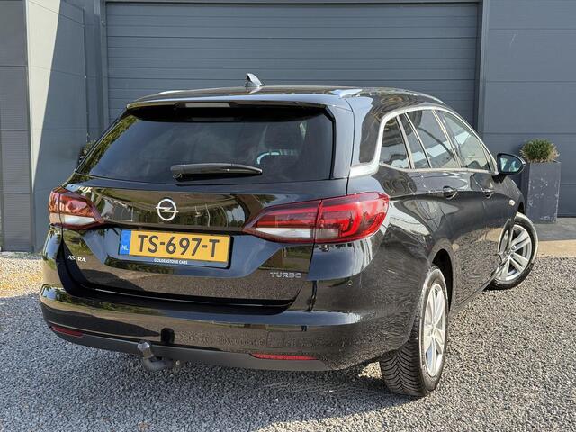Opel ASTRA Sports Tourer 1.4 Innovation Automaat,Navi,Trekhaak,Camera,Clima,Cruise,150pk,Lm velgen,Pdc V+A,Elekt.Stoelen,Stoelverwarming,Stuurverwarming,Apk tot 07-2026