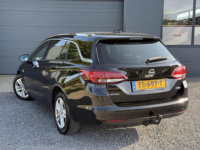 Opel ASTRA Sports Tourer 1.4 Innovation Automaat,Navi,Trekhaak,Camera,Clima,Cruise,150pk,Lm velgen,Pdc V+A,Elekt.Stoelen,Stoelverwarming,Stuurverwarming,Apk tot 07-2026