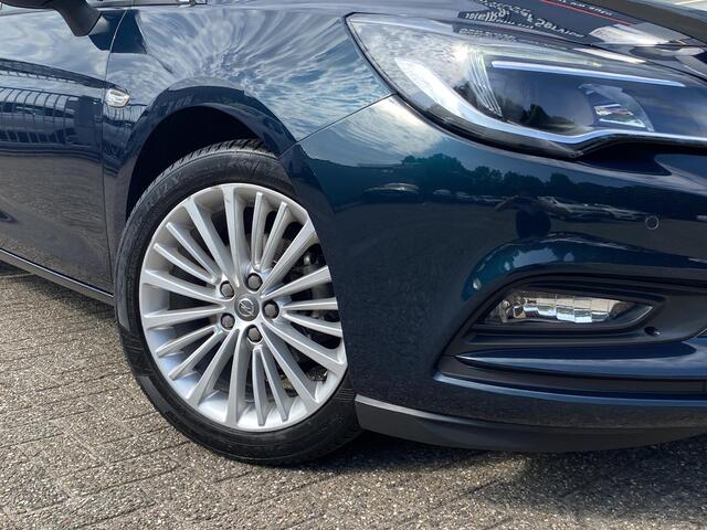 Opel ASTRA 1.0 Business+ / 105 Pk / NL-Auto / Schuif-Kanteldak / Comfortstoelen / Apple-Carplay & Android-Auto / DAB / Navi / Camera / Climate-Control / Cruise-Control / Rijstrooksensor / ELKTR-Pakket / PDC / LMV 17'' / ENZ.