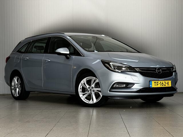 Opel ASTRA Sports Tourer 1.0 Business Executive/ LED Dagrijverl./ 17''LMV/ Apple+Android/ Clima/ Navi/ Cruise/ Lane-Assist/ Elek.Pakket/ Bluetooth/ Multi.LEDER.Stuur/ PDC V+A.