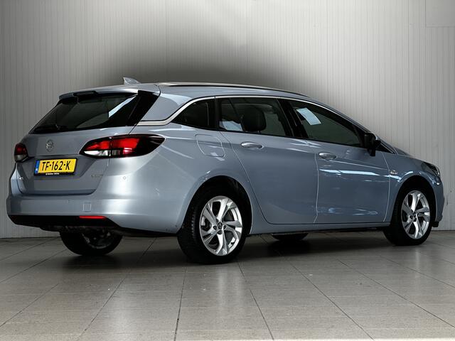 Opel ASTRA Sports Tourer 1.0 Business Executive/ LED Dagrijverl./ 17''LMV/ Apple+Android/ Clima/ Navi/ Cruise/ Lane-Assist/ Elek.Pakket/ Bluetooth/ Multi.LEDER.Stuur/ PDC V+A.