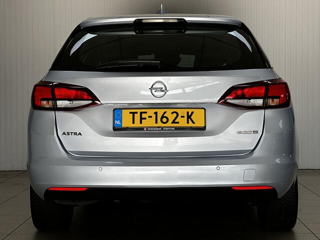 Opel ASTRA Sports Tourer 1.0 Business Executive/ LED Dagrijverl./ 17''LMV/ Apple+Android/ Clima/ Navi/ Cruise/ Lane-Assist/ Elek.Pakket/ Bluetooth/ Multi.LEDER.Stuur/ PDC V+A.