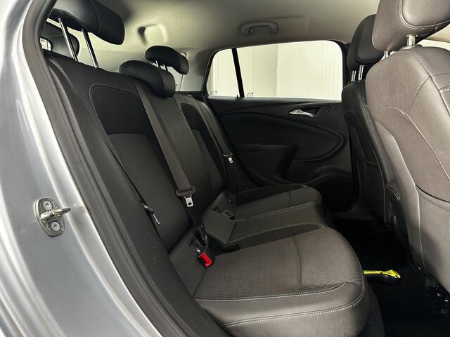 Opel ASTRA Sports Tourer 1.0 Business Executive/ LED Dagrijverl./ 17''LMV/ Apple+Android/ Clima/ Navi/ Cruise/ Lane-Assist/ Elek.Pakket/ Bluetooth/ Multi.LEDER.Stuur/ PDC V+A.