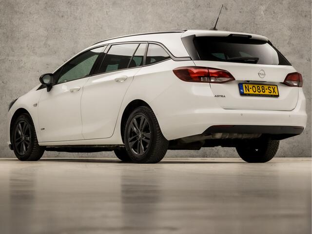 Opel ASTRA Sports Tourer 1.2 Innovation Sport (APPLE CARPLAY, CAMERA, GROOT NAVIGATIE, ADAPTIVE CRUISE, LEDER, GETINT GLAS, SPORTSTOELEN, LED KOPLAMPEN, CRUISE, PARKEERSENSOREN, NIEUWE APK, NIEUWSTAAT)