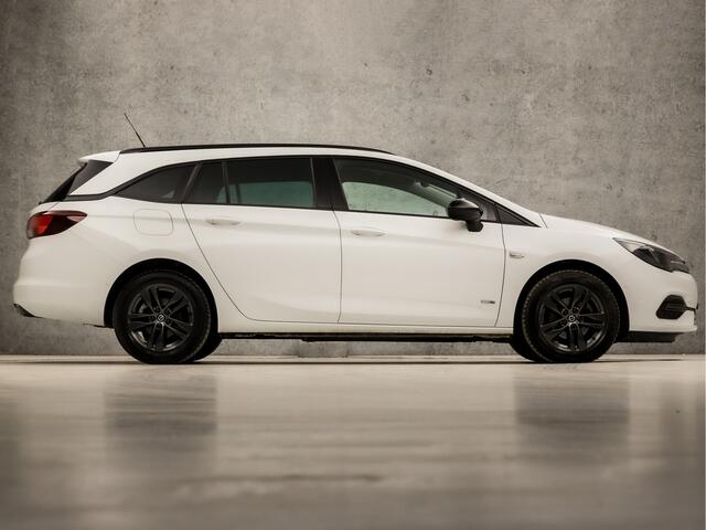 Opel ASTRA Sports Tourer 1.2 Innovation Sport (APPLE CARPLAY, CAMERA, GROOT NAVIGATIE, ADAPTIVE CRUISE, LEDER, GETINT GLAS, SPORTSTOELEN, LED KOPLAMPEN, CRUISE, PARKEERSENSOREN, NIEUWE APK, NIEUWSTAAT)