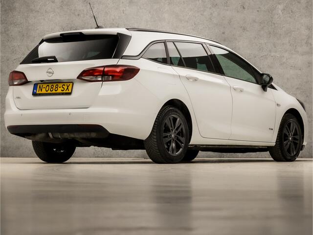 Opel ASTRA Sports Tourer 1.2 Innovation Sport (APPLE CARPLAY, CAMERA, GROOT NAVIGATIE, ADAPTIVE CRUISE, LEDER, GETINT GLAS, SPORTSTOELEN, LED KOPLAMPEN, CRUISE, PARKEERSENSOREN, NIEUWE APK, NIEUWSTAAT)