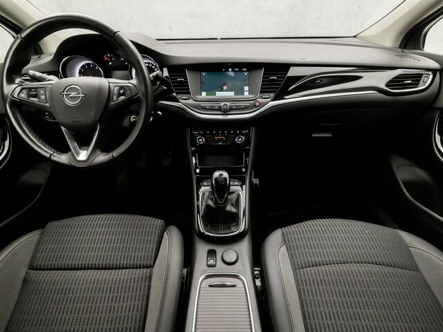 Opel ASTRA Sports Tourer 1.2 Innovation Sport (APPLE CARPLAY, CAMERA, GROOT NAVIGATIE, ADAPTIVE CRUISE, LEDER, GETINT GLAS, SPORTSTOELEN, LED KOPLAMPEN, CRUISE, PARKEERSENSOREN, NIEUWE APK, NIEUWSTAAT)