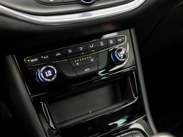 Opel ASTRA Sports Tourer 1.2 Innovation Sport (APPLE CARPLAY, CAMERA, GROOT NAVIGATIE, ADAPTIVE CRUISE, LEDER, GETINT GLAS, SPORTSTOELEN, LED KOPLAMPEN, CRUISE, PARKEERSENSOREN, NIEUWE APK, NIEUWSTAAT)