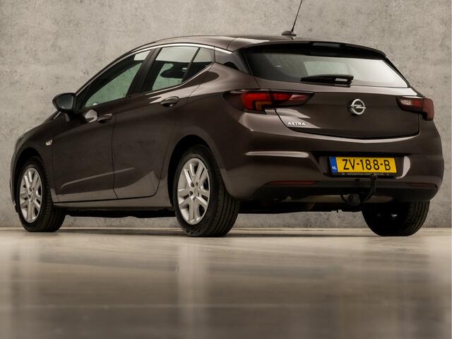 Opel ASTRA 1.4 Turbo Sport 150Pk Automaat (APPLE CARPLAY, GROOT NAVI, CLIMATE, LM VELGEN, SPORTSTOELEN, TREKHAAK, PARKEERSENSOREN, NIEUWE APK, NIEUWSTAAT)