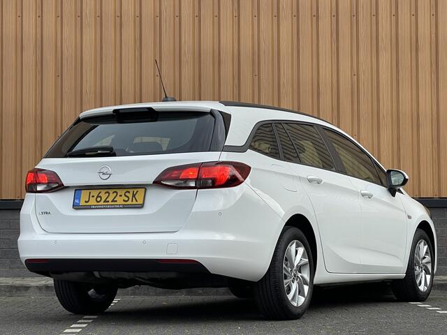 Opel ASTRA Sports Tourer 1.2 Edition | Cruise Control | Parkeersensoren Achter | Apple Carplay/Android Auto | DAB | Navigatie |