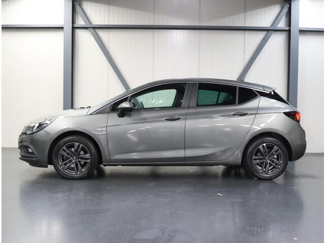 Opel ASTRA 150PK 120 Jaar Edition | 1ste eigenaar | AppleCarPlay/AndroidAuto | Climate Control | Parkeersensoren VOOR+Achter | Navigatie | Privacy Glass | AUTOMAAT | Isofix | LMV |