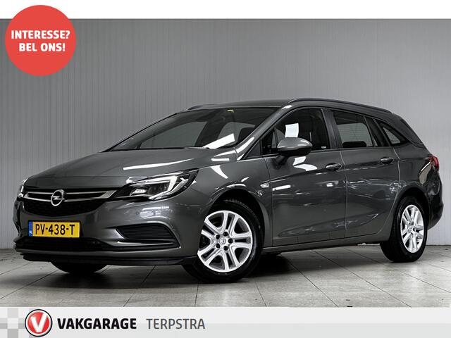Opel ASTRA Sports Tourer 1.0 Online Edition/ PDC V+A/ Apple + Android/ DAB+/ Navi/ Airco/ Cruise/ Elek. pakket/ Isofix/ Bluetooth/ Armsteun/ Multi. LEDER. Stuur/ LED Dagrijverl.
