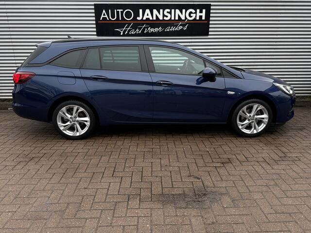 Opel ASTRA Sports Tourer 1.2 Launch Edition | Stoel/Stuurverwarming | Camera | Elekt. Kofferklep | Trekhaak | Verwarmde Voorruit | RIJKLAARPRIJS INCL 12 MAANDEN GARANTIE EN BEURT