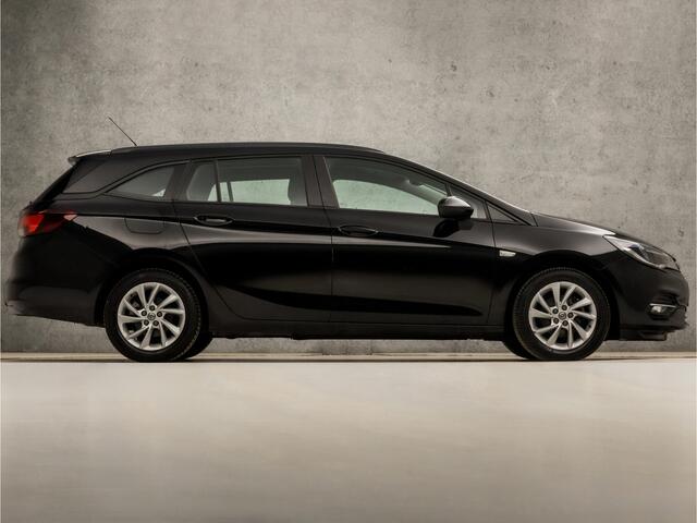 Opel ASTRA Sports Tourer 1.2 Sport (APPLE CARPLAY, NAVIGATIE, CLIMATE, CAMERA, SPORTSTOELEN, LM VELGEN, CRUISE, NIEUWSTAAT)