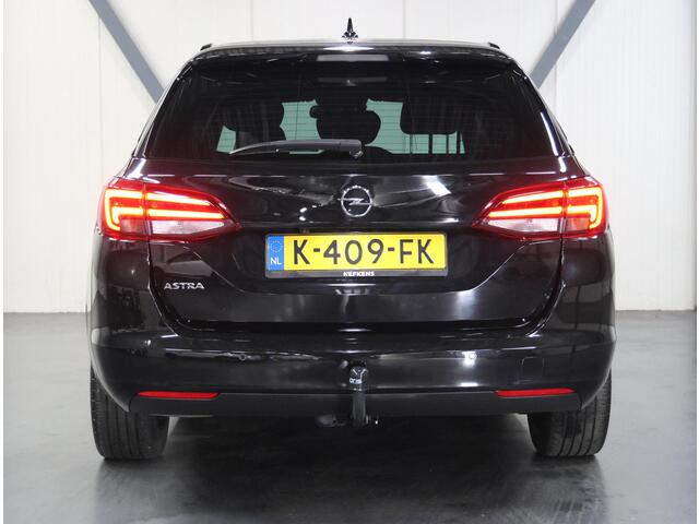 Opel ASTRA Sports Tourer 1.2 Turbo 145PK Ultimate | AppleCarPlay/AndroidAuto | Alcantara | Armsteun | Navigatie | Adaptive Cruise Control | Keyless | AGR Stoelen | Trekhaak | LED | Camera | Climate Control | DAB Radio | Isofix | Privacy Glass | Parkeersensoren |
