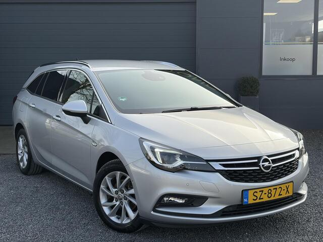 Opel ASTRA Sports Tourer 1.4 Innovation Dealer Onderhouden,Navi,Camera,Trekhaak,150pk,Keyless,Rijstrooksensor,Halfleder,2e Eigenaar,Lm velgen,BSD,PDC V+A,N.A.P,Apk tot 12-2026