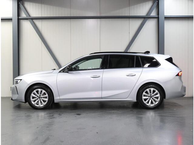 Opel ASTRA Sports Tourer 1.2 Business Edition 110PK | 1ste eigenaar | Navigatie | Climate Control | Adaptieve Cruise Control | Achteruitrijcamera | Parkeersensoren Voor + Achter | 16" Lichtmetalen Velgen | Verwarmbare Voorstoelen | Keyless Entry/Start | AppleCarplay