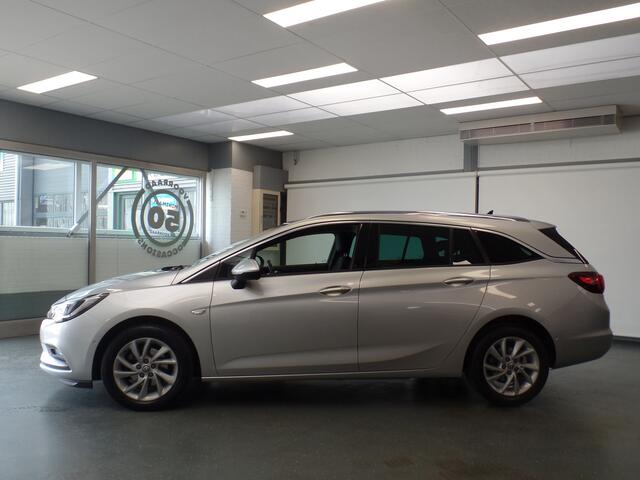 Opel ASTRA Sports Tourer 1.0 Turbo Innovation Navigatie, Achteruitrijcamera, Elek achterklep, Clima controle, Cruise controle, Elek ramen/Spiegels, Deels leder, Xenon, Pdc V/A, Lm velgen 16'', Nederlandse auto!! Bovag afleverpakket 695,-