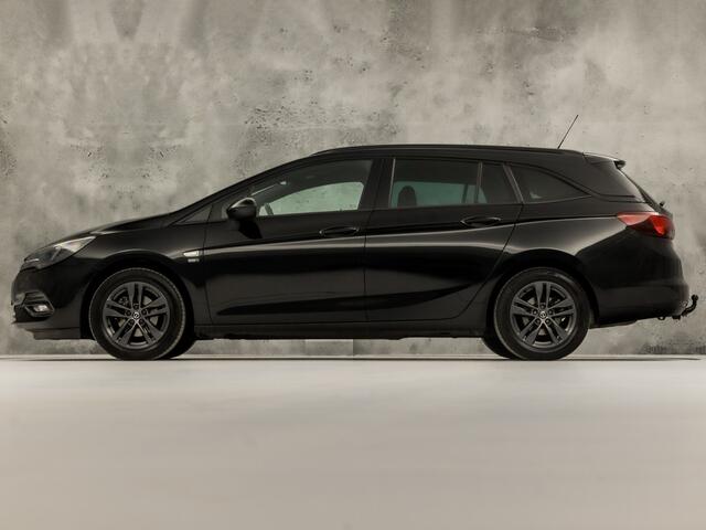 Opel ASTRA Sports Tourer 1.2 Sport (APPLE CARPLAY, CAMERA, CLIMATE, ZWART HEMEL, ADAPTIVE CRUISE, SPORTSTOELEN, GETINT GLAS, TREKHAAK, NIEUWSTAAT)