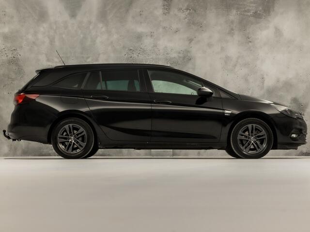 Opel ASTRA Sports Tourer 1.2 Sport (APPLE CARPLAY, CAMERA, CLIMATE, ZWART HEMEL, ADAPTIVE CRUISE, SPORTSTOELEN, GETINT GLAS, TREKHAAK, NIEUWSTAAT)