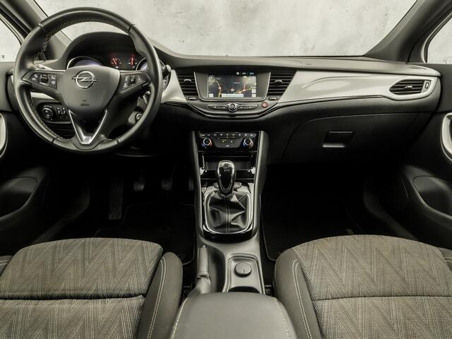 Opel ASTRA Sports Tourer 1.2 Sport (APPLE CARPLAY, CAMERA, CLIMATE, ZWART HEMEL, ADAPTIVE CRUISE, SPORTSTOELEN, GETINT GLAS, TREKHAAK, NIEUWSTAAT)