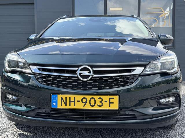 Opel ASTRA Sports Tourer 1.4 Innovation 2e Eigenaar,Apple Carplay/Android Auto,150pk,Halfleder,Trekhaak,Keyless,Clima,Cruise,Lm velgen,Pdc V+A,N.A.P,Dealer Onderhouden,Rijstrooksensor,Apk tot 03-2027