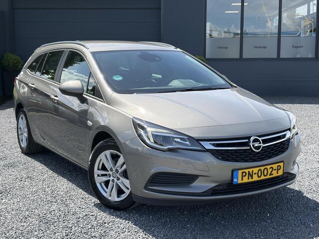 Opel ASTRA Sports Tourer 1.4 Online Edition 1e Eigenaar,Carplay,Navi,Trekhaak,Clima,Cruise,150pk,Rijstrooksensor,6 Bak,Elekt.Stoelen,Lm velgen,Dealer Onderhouden,Apk tot 04-2027