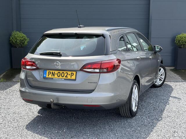 Opel ASTRA Sports Tourer 1.4 Online Edition 1e Eigenaar,Carplay,Navi,Trekhaak,Clima,Cruise,150pk,Rijstrooksensor,6 Bak,Elekt.Stoelen,Lm velgen,Dealer Onderhouden,Apk tot 04-2027