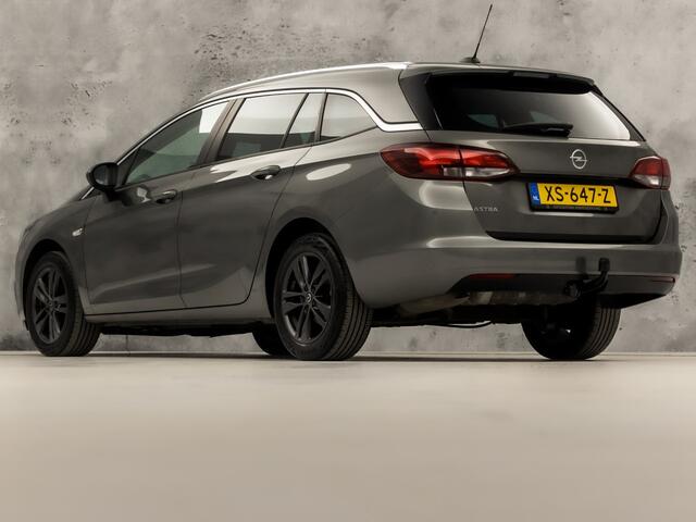 Opel ASTRA Sports Tourer 1.0 Turbo Sport (APPLE CARPLAY, GROOT NAVI, CLIMATE, GETINT GLAS, SPORTSTOELEN, PARKEERSENSOREN, CRUISE, TREKHAAK, NIEUWSTAAT)