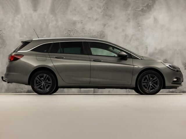 Opel ASTRA Sports Tourer 1.0 Turbo Sport (APPLE CARPLAY, GROOT NAVI, CLIMATE, GETINT GLAS, SPORTSTOELEN, PARKEERSENSOREN, CRUISE, TREKHAAK, NIEUWSTAAT)