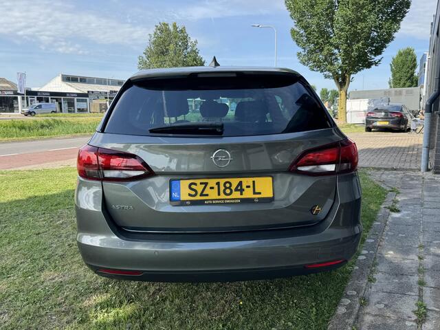 Opel ASTRA Sports Tourer 1.0 Online Edition Incl. 12M garantie en beurt incl! | 1e eigenaar | Carplay | Cruise | Climate control | NL Auto