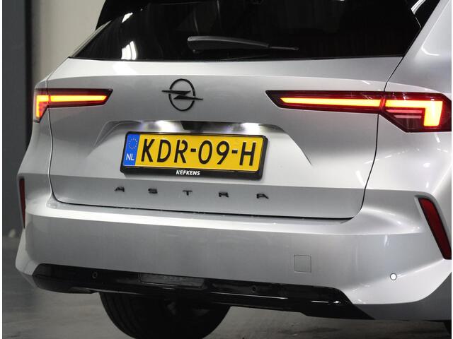 Opel ASTRA Electric 58 kWh 156PK Ultimate | 1ste eigenaar | AppleCarPlay/AndroidAuto | Schuifkanteldak | Head-Up Display | Navigatie | Adaptive Cruise Control | Keyless | AGR Stoelen | Stoel/Stuur/Voorruitverwarming | FULL LED | Camera | Isofix | Privacy Glass |