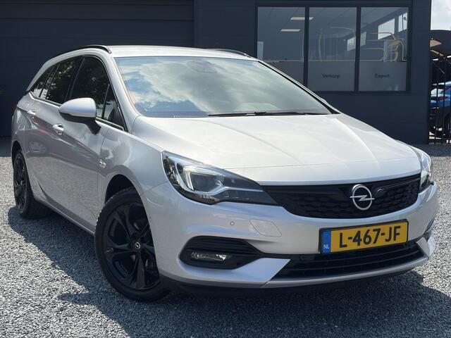 Opel ASTRA Sports Tourer 1.2 Ultimate 146pk,Camera,Keyless,Carplay,6 Bak,Afn Trekhaak,Stoelverw,Lm velgen,Alcantara-Leder,Dealer Onderhouden,Clima,Cruise,Dodehoek,Rijstrooksensor,N.A.P,PDc V+A,Apk tot 07-2028