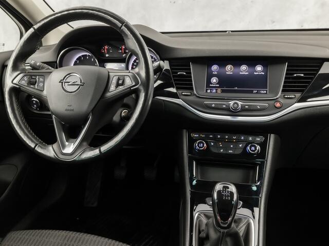 Opel ASTRA 1.2 Blitz Elegance 131Pk (APPLE CARPLAY, GROOT NAVI, ADAPTIVE CRUISE, CLIMATE, STUUR/STOELVERWARMING, SPORTSTOELEN, CAMERA, TREKHAAK, LEDER, GETINT GLAS, NIEUWSTAAT)