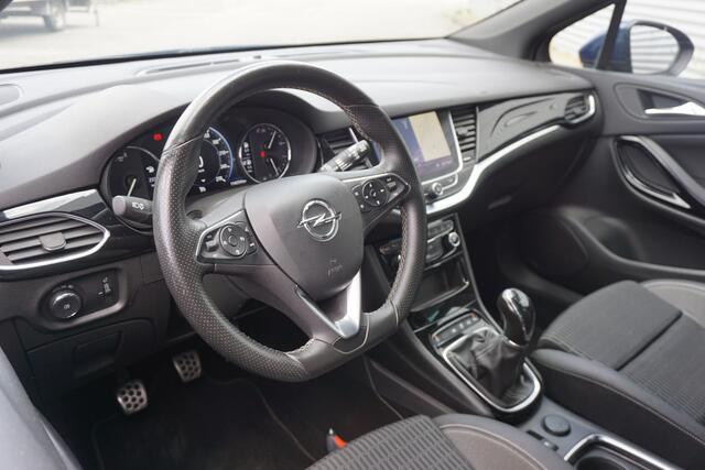 Opel ASTRA Sports Tourer 1.2 Elegance Airco / Navi / Cruise / Camera / Parkeers. / Trekhaak / Lm velgen / NAP