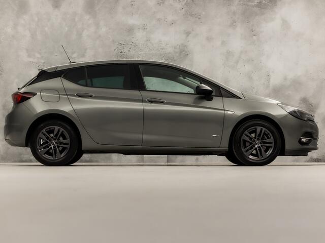 Opel ASTRA 1.2 Blitz Edition (APPLE CARPLAY, NAVIGATIE, STUUR/STOELVERWARMING, CLIMATE, CAMERA, SPORTSTOELEN, GETINT GLAS, ADAPTIVE CRUISE, NIEUWSTAAT)